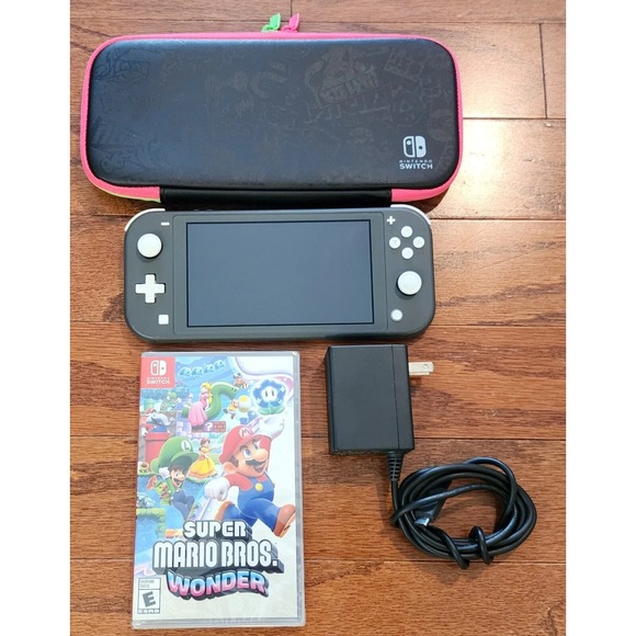 Nintendo Other - Nintendo Switch Lite Gray Console w/ Case + Mario Wonder Game